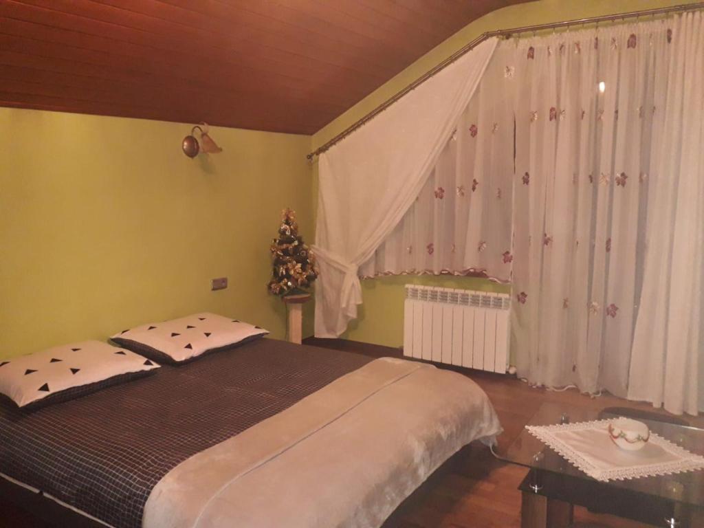 Postel nebo postele na pokoji v ubytování Zielona zagroda