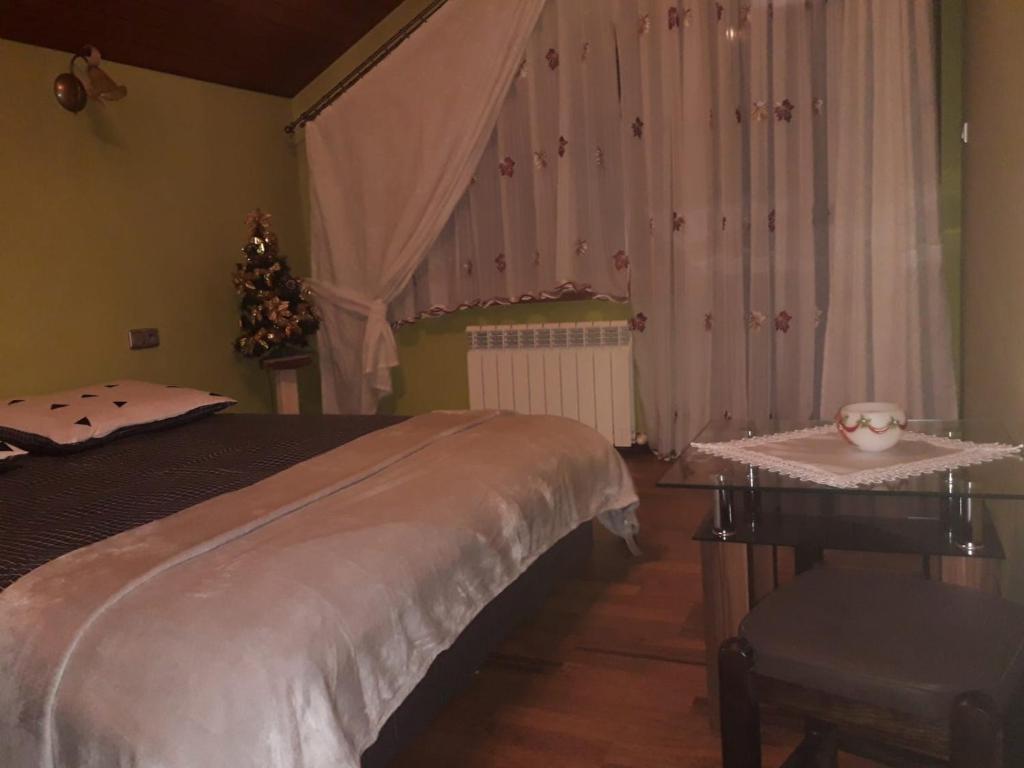 Postel nebo postele na pokoji v ubytování Zielona zagroda