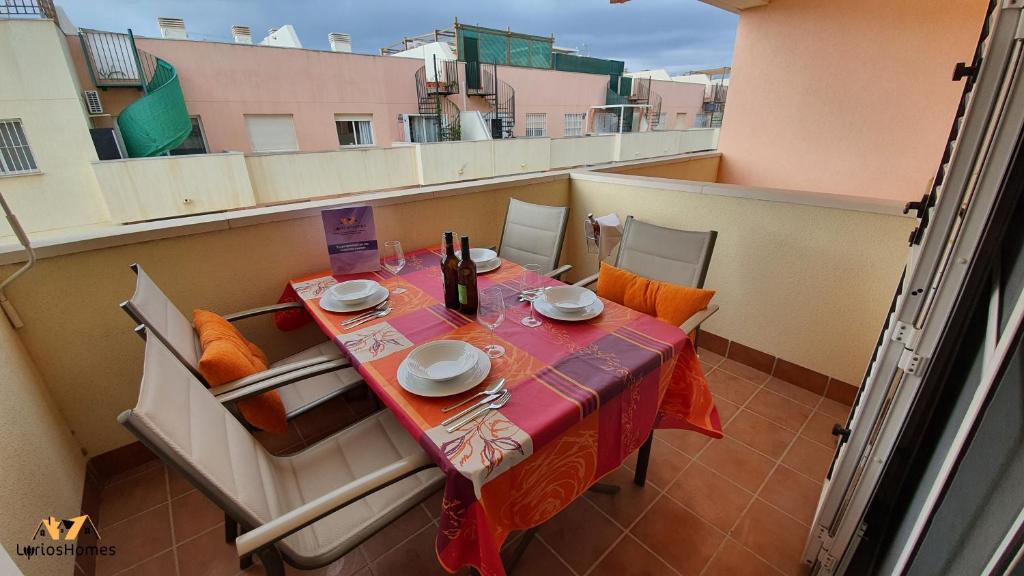 Balkón nebo terasa v ubytování LyriosHomes Beach Roquetas de Mar , Piscina y parque infantil