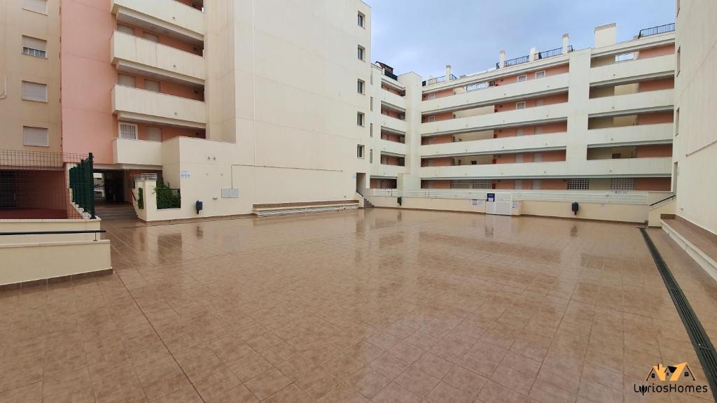 Bazén v ubytování LyriosHomes Beach Roquetas de Mar , Piscina y parque infantil nebo v jeho okolí