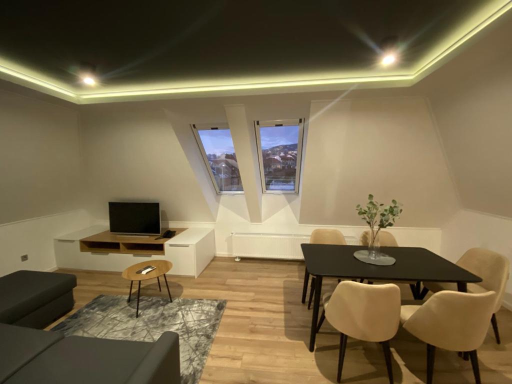 TV a/nebo společenská místnost v ubytování Minaret Residence & Relax Pécs