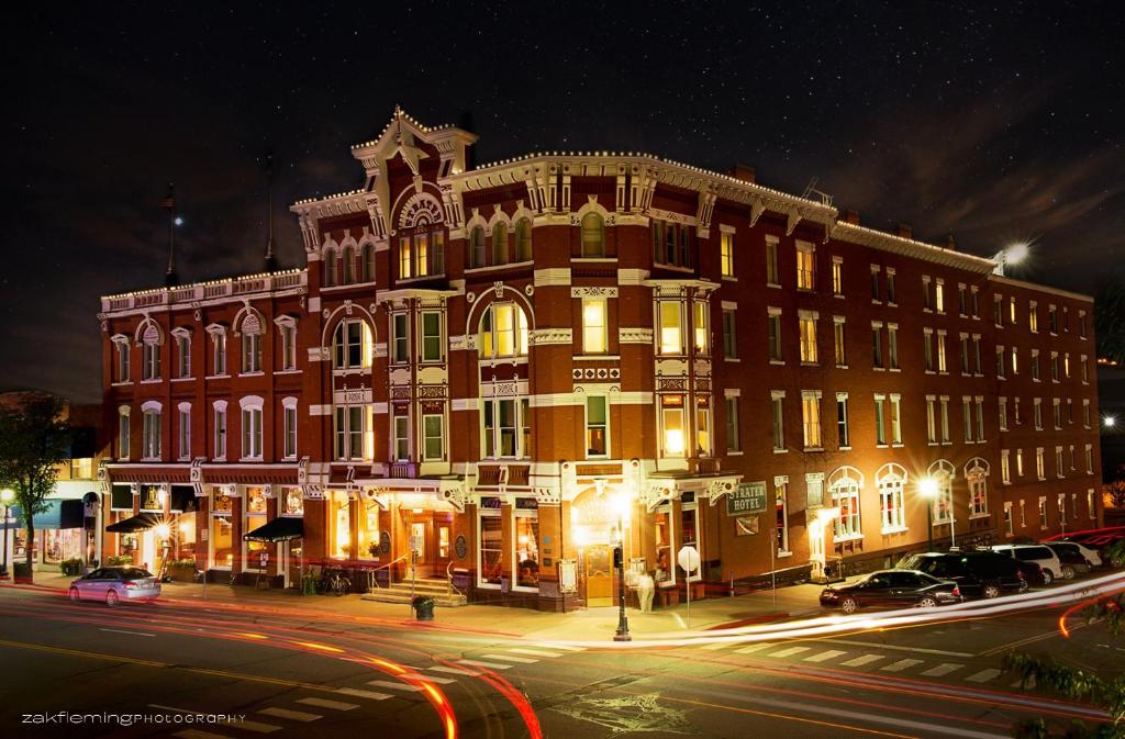 a large brick building with a clock tower on top of it at The Strater Hotel in Durango