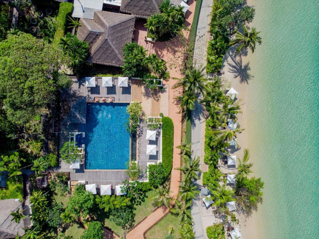 an aerial view of a resort with a swimming pool at Le Vimarn Cottages & Spa in Ko Samed