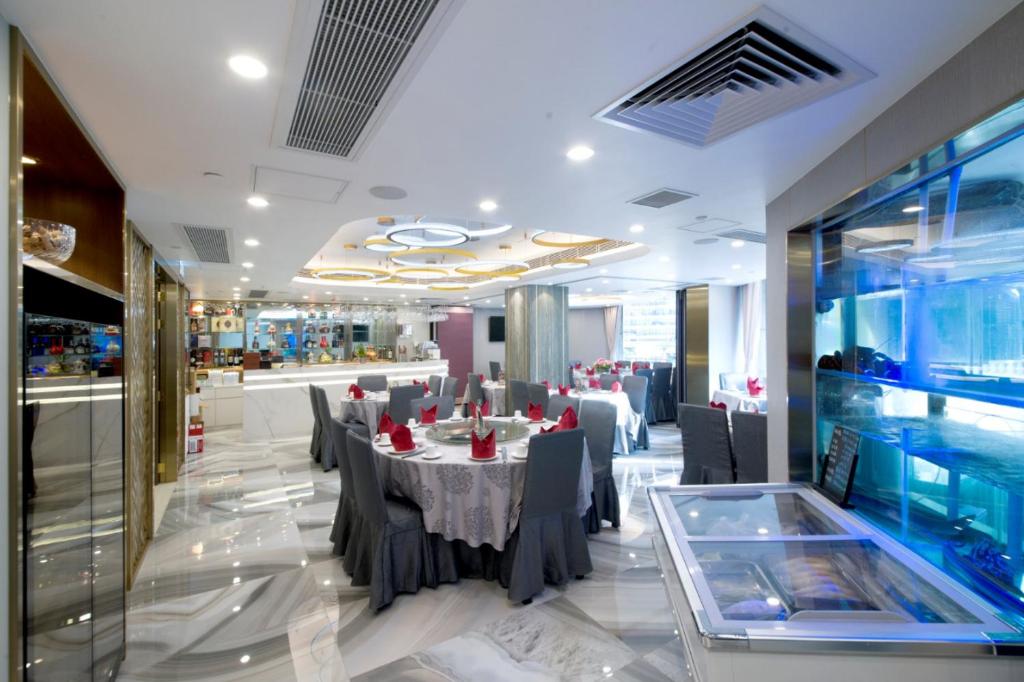 TV a/nebo společenská místnost v ubytování Hotel Guia