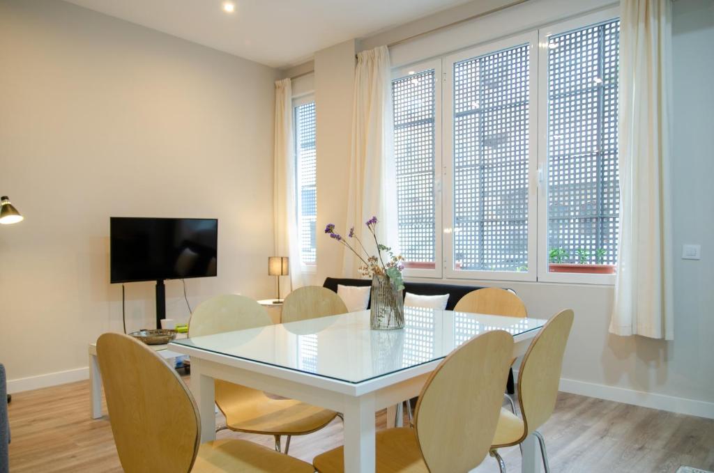 Televízia a/alebo spoločenská miestnosť v ubytovaní Integralix Lofts