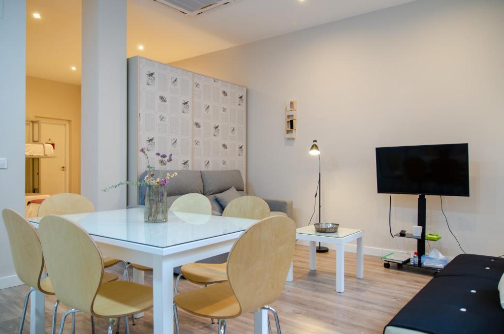 Televízia a/alebo spoločenská miestnosť v ubytovaní Integralix Lofts