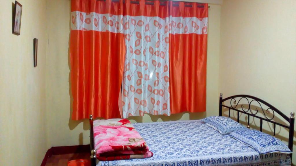 Postel nebo postele na pokoji v ubytování Backpackers Hostel