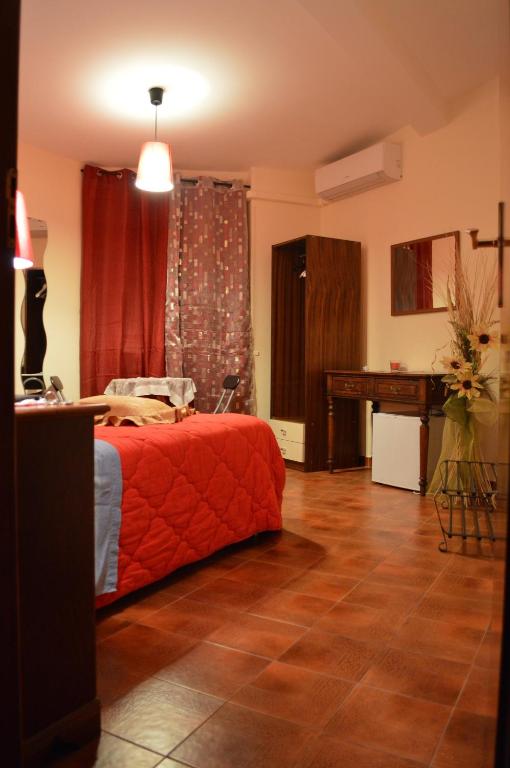 Postel nebo postele na pokoji v ubytování La Casa Nei Sassi