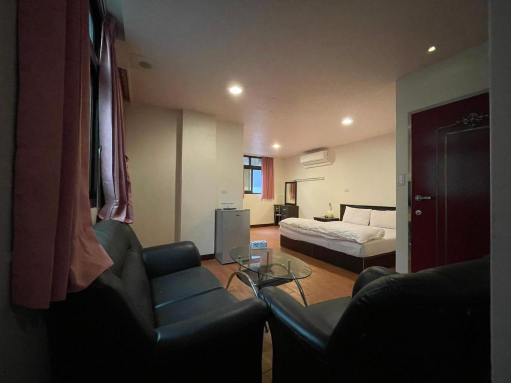 Postel nebo postele na pokoji v ubytování Da Fang Hotel