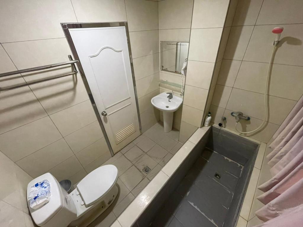 Koupelna v ubytování Da Fang Hotel