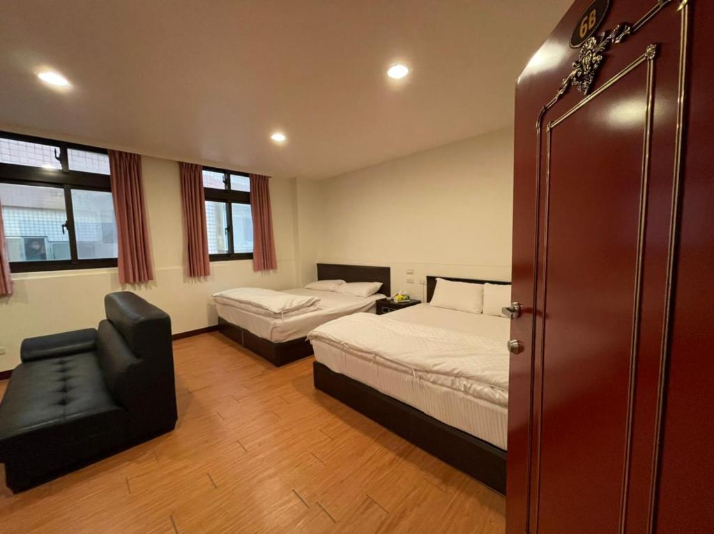 Postel nebo postele na pokoji v ubytování Da Fang Hotel
