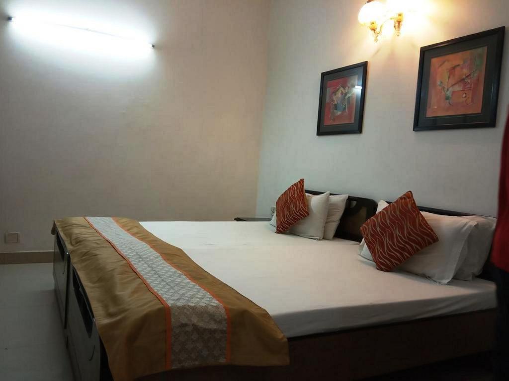 Postel nebo postele na pokoji v ubytování Solo Victoria Hotel