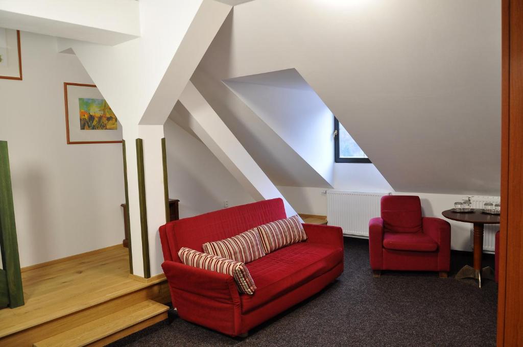 Posezení v ubytování Hotel U Bílého koně