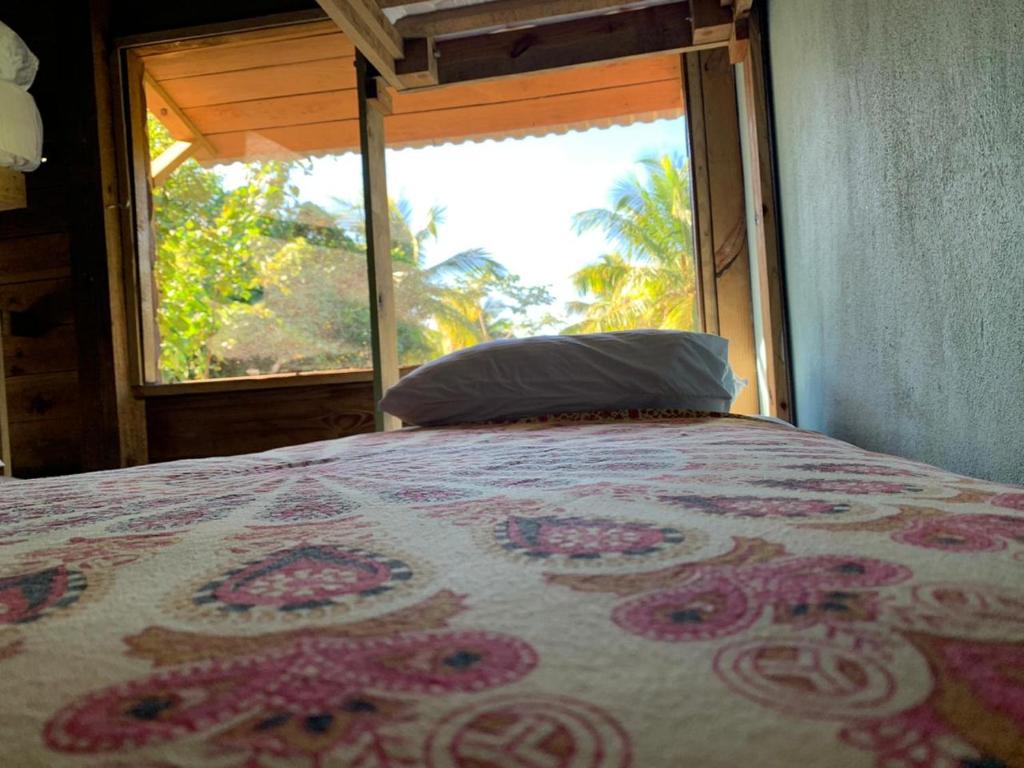 Postel nebo postele na pokoji v ubytování Aventura Rincon Ecolodge