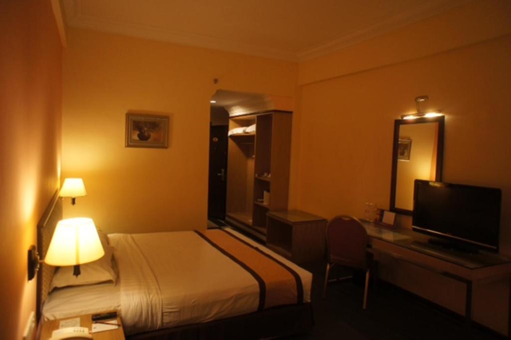 TV a/nebo společenská místnost v ubytování Tyng Garden Hotel