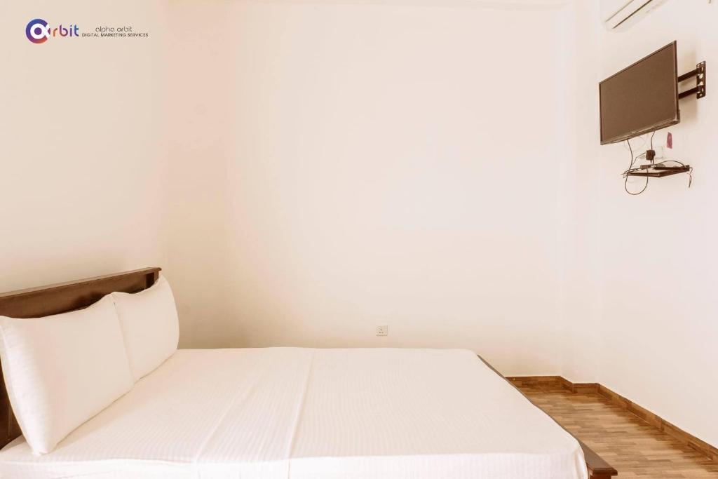 Postel nebo postele na pokoji v ubytování The Grand Pearl Resort