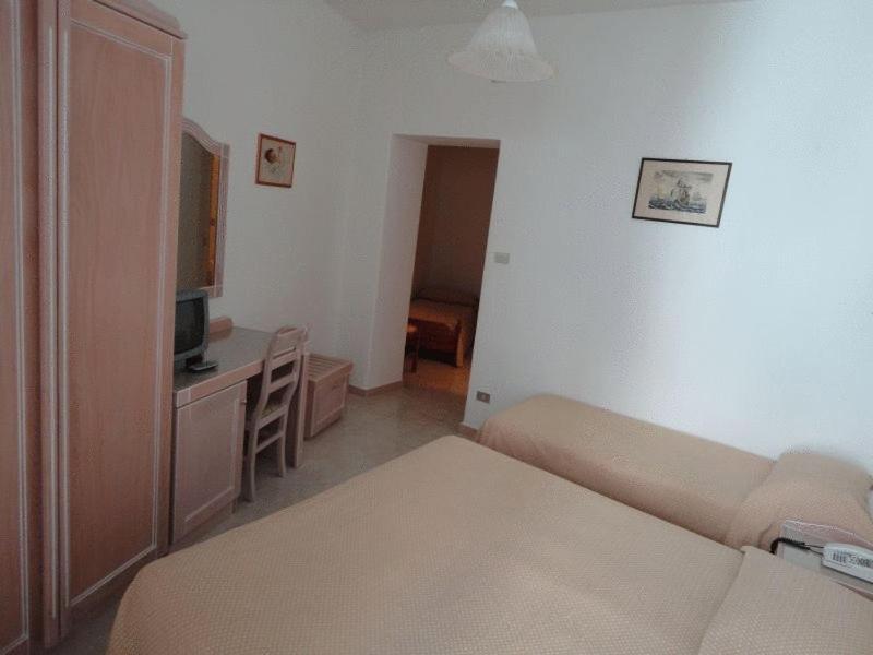 TV a/nebo společenská místnost v ubytování Hotel Candia