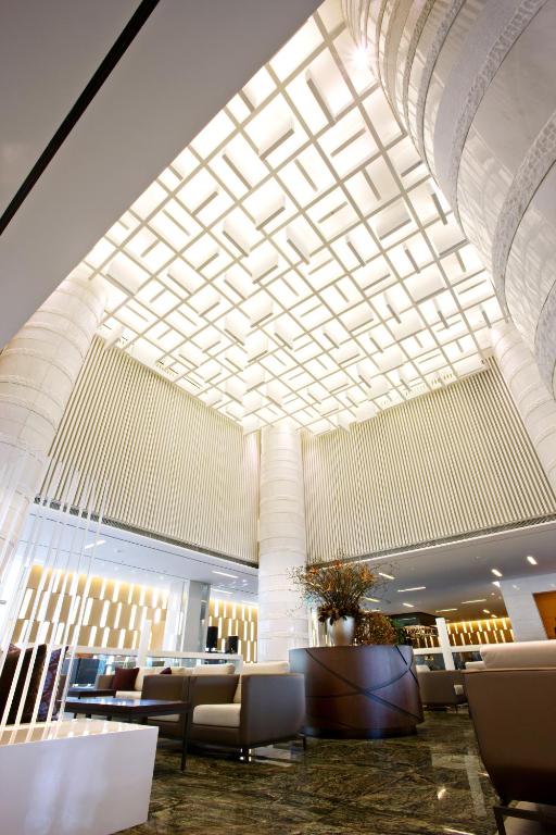 Posezení v ubytování Ramada Plaza by Wyndham Suwon