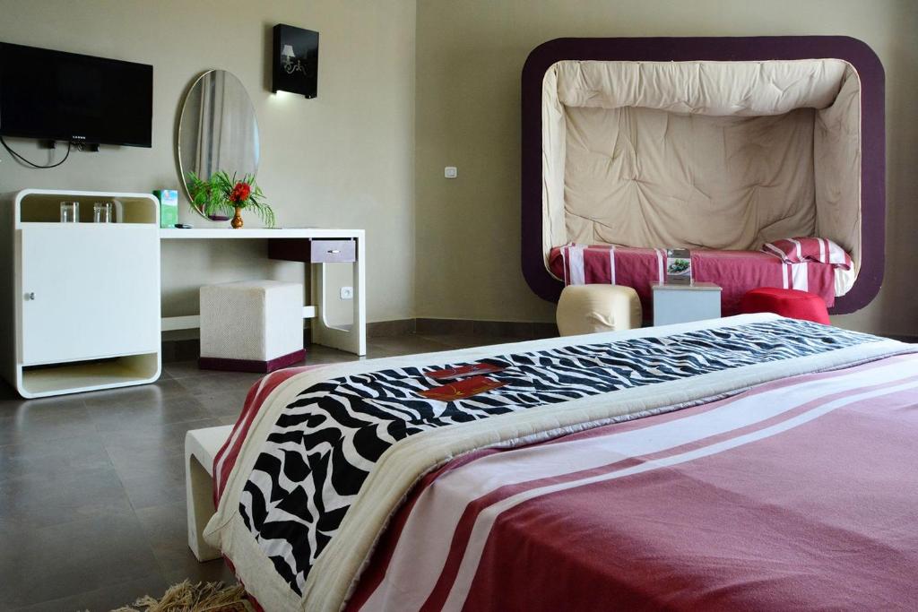 Postel nebo postele na pokoji v ubytování Fiesta Beach Djerba