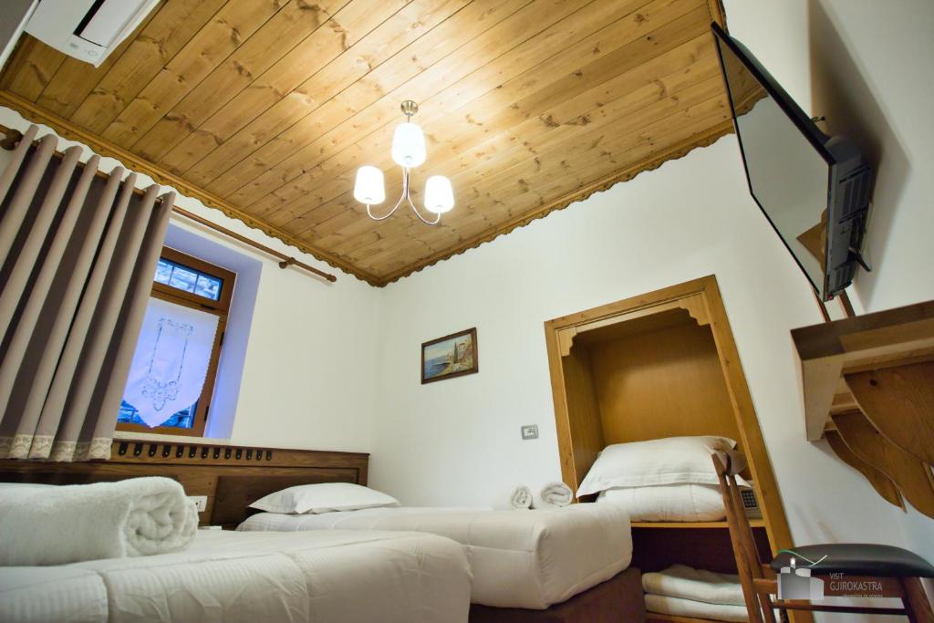 Llit o llits en una habitació de Boutique Hotel Praga