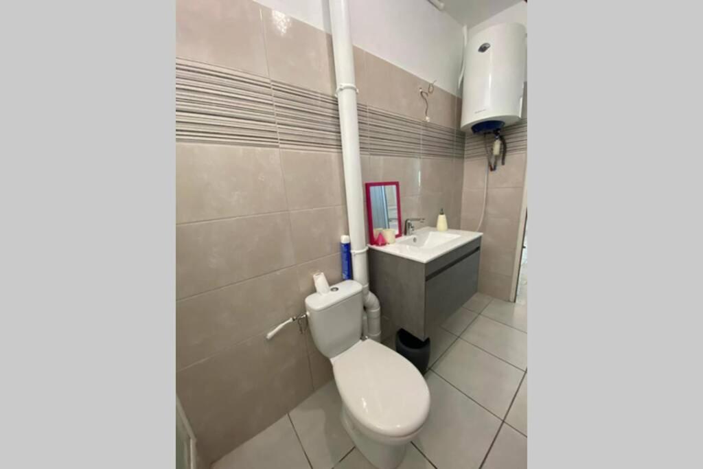 Koupelna v ubytování Charmant appartement avec piscine