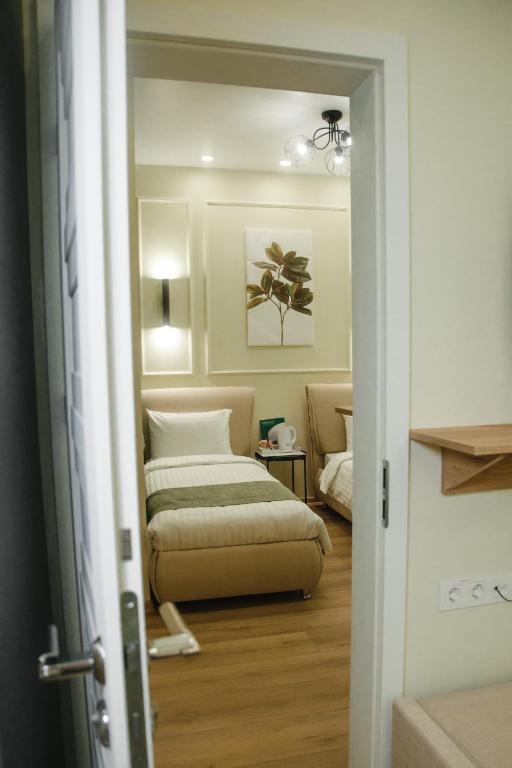 Postel nebo postele na pokoji v ubytování Dream Hotel