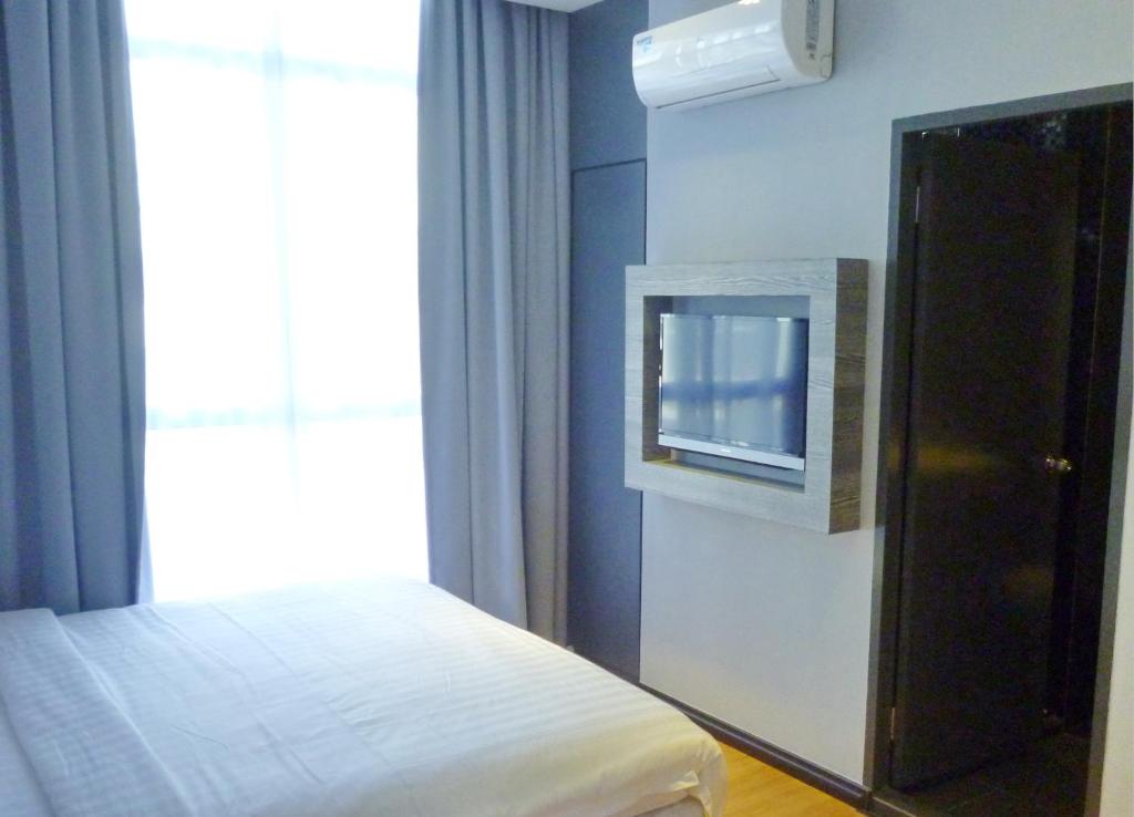 Postel nebo postele na pokoji v ubytování My Dream Hotel