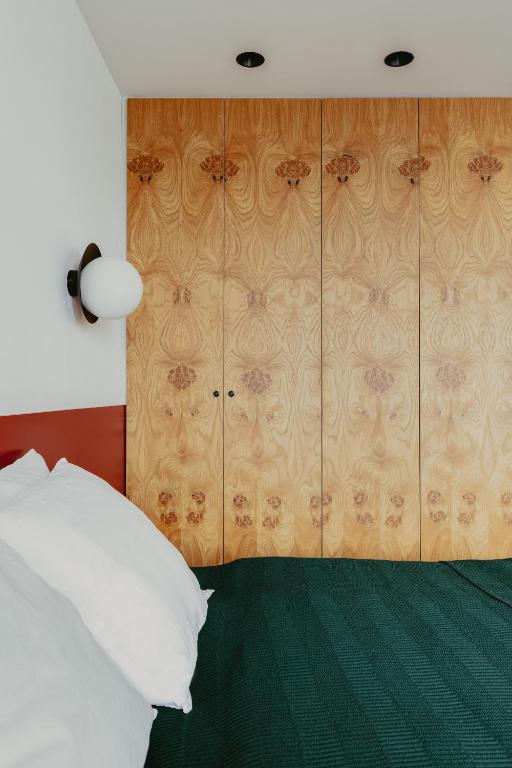 Posteľ alebo postele v izbe v ubytovaní Apartament Strefa Kultury