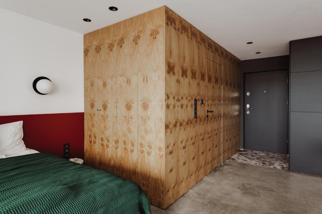 Posteľ alebo postele v izbe v ubytovaní Apartament Strefa Kultury