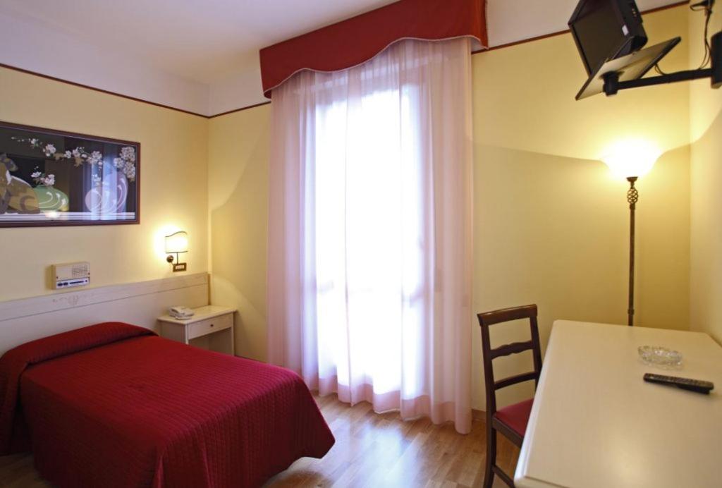 Postel nebo postele na pokoji v ubytování Fortuna Resort