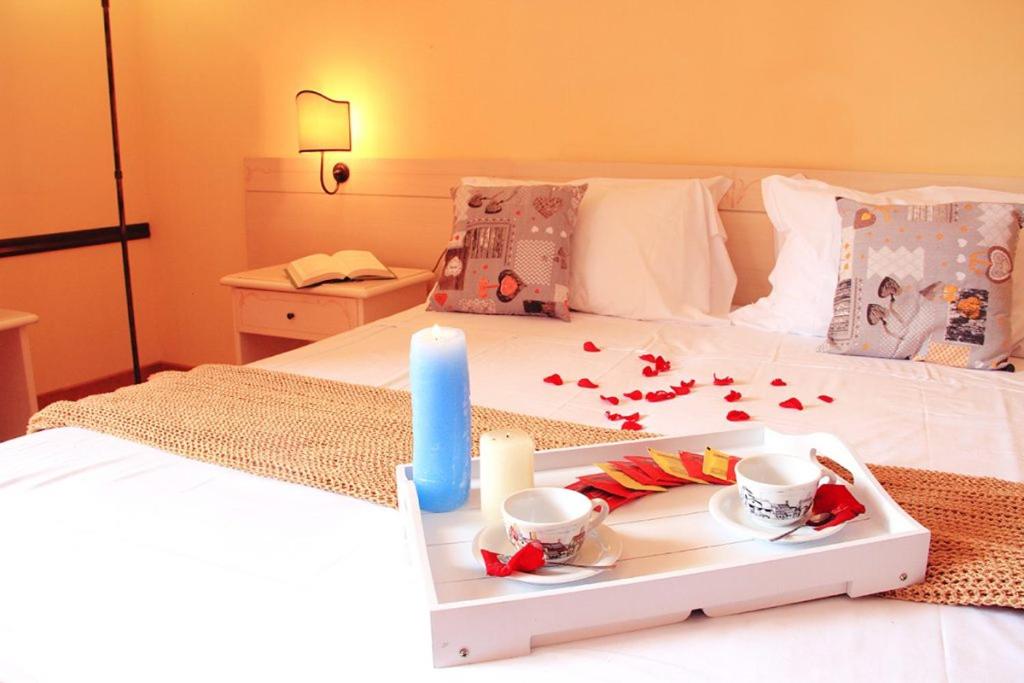 Postel nebo postele na pokoji v ubytování Fortuna Resort