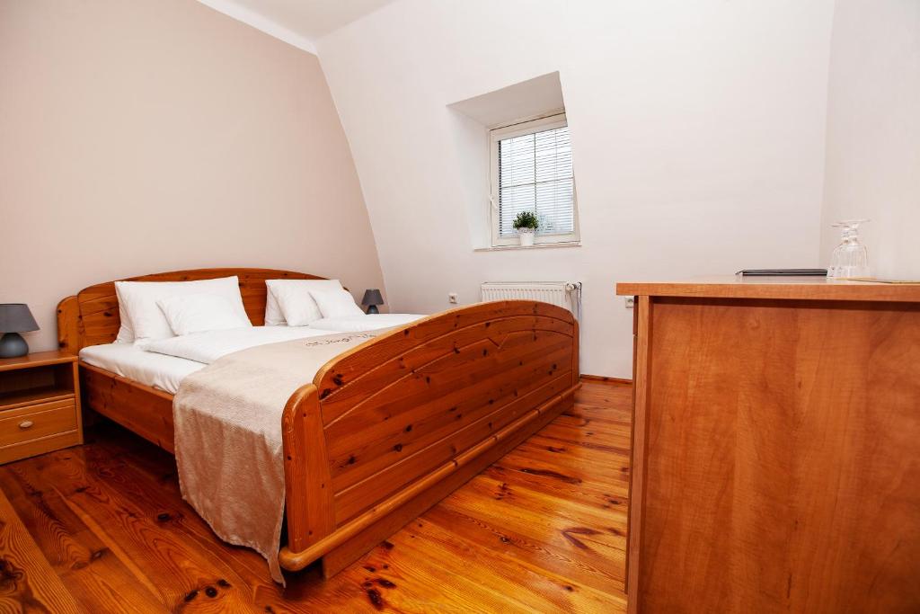 Postel nebo postele na pokoji v ubytování Apartmány Rossini