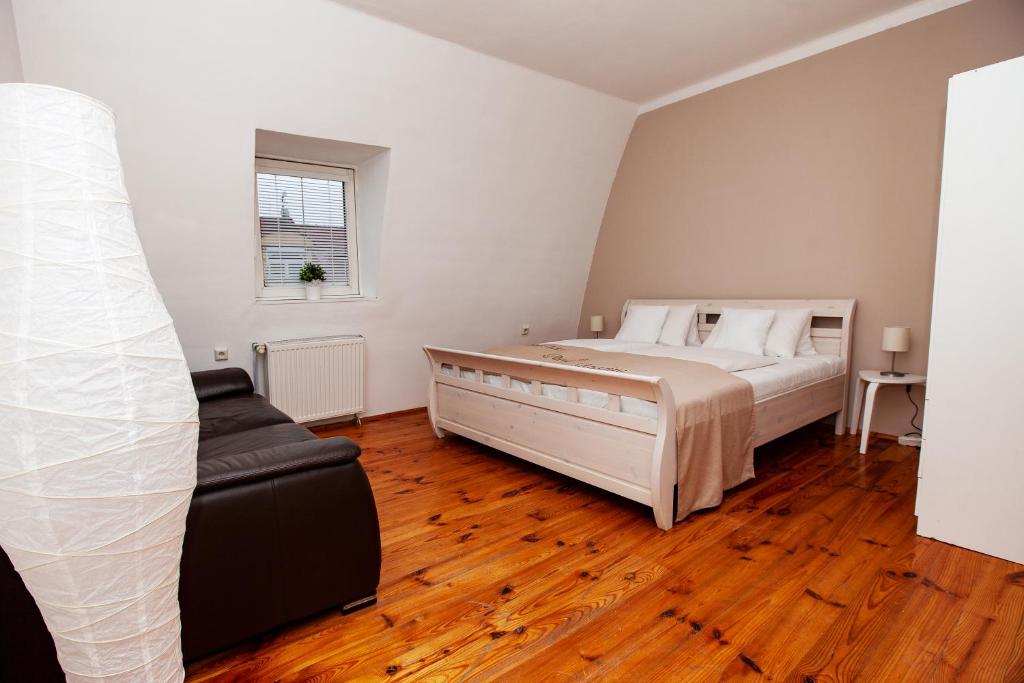 Postel nebo postele na pokoji v ubytování Apartmány Rossini