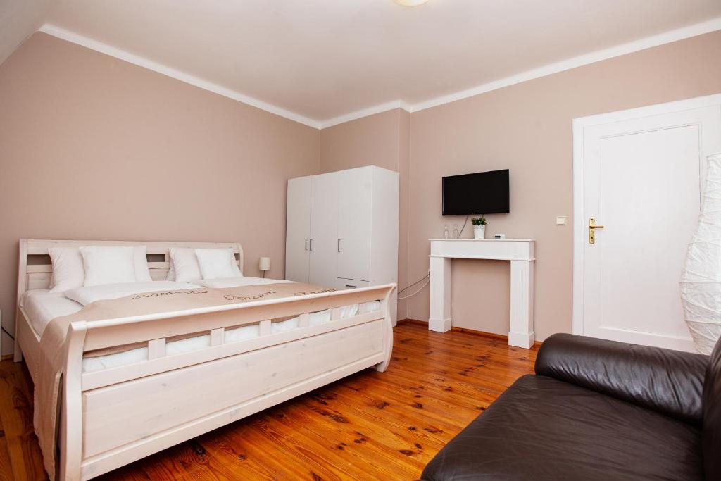 Postel nebo postele na pokoji v ubytování Apartmány Rossini