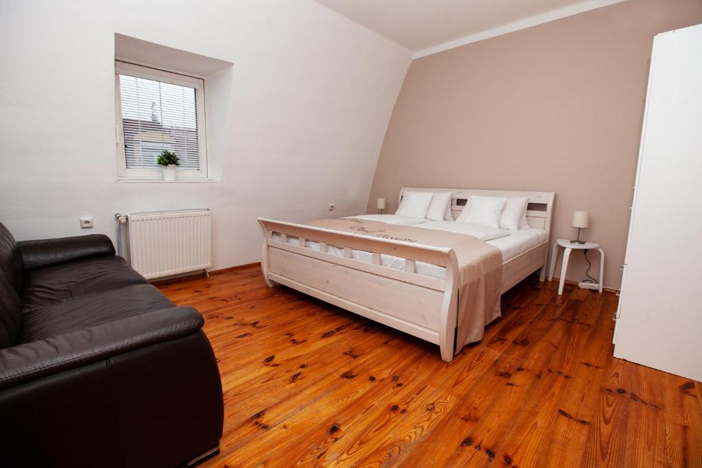 Postel nebo postele na pokoji v ubytování Apartmány Rossini