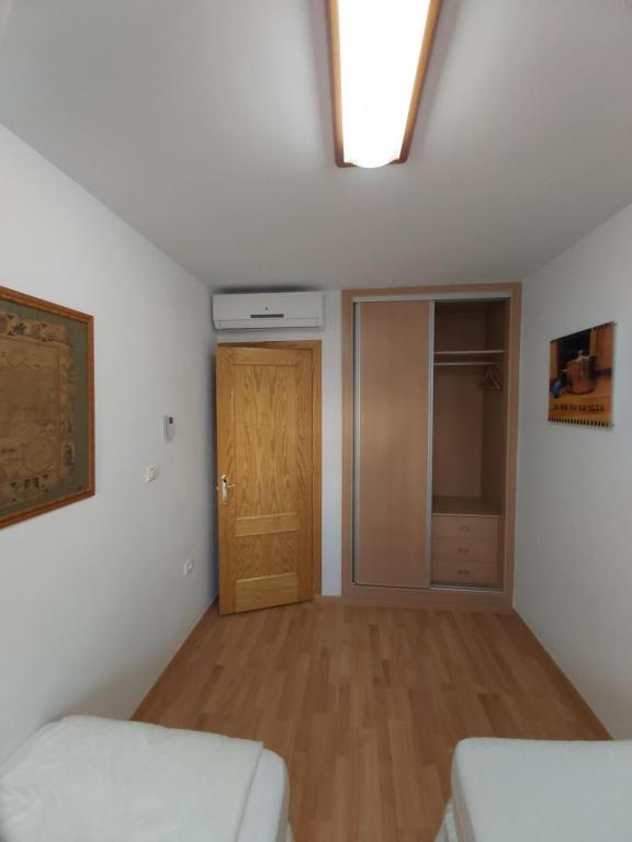 Posteľ alebo postele v izbe v ubytovaní Apartamento en Urbanizacíon Residencial