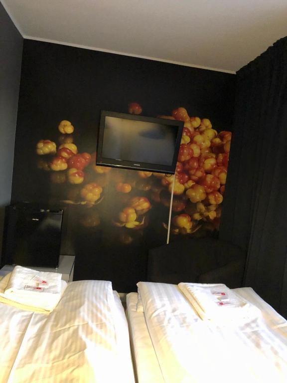 Postel nebo postele na pokoji v ubytování Hotel Lapland River