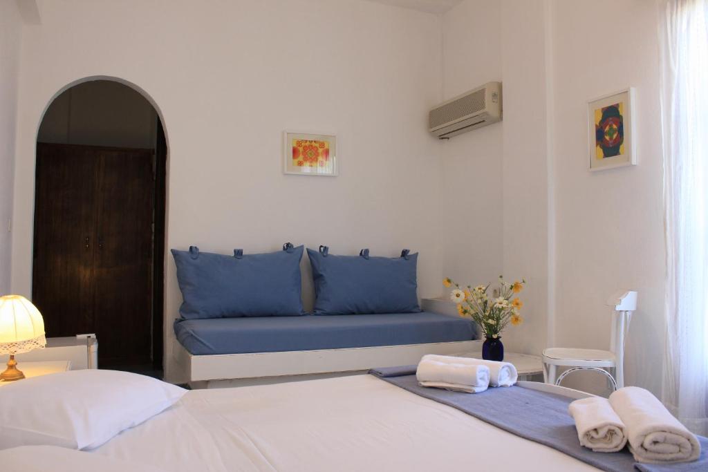 Postel nebo postele na pokoji v ubytování Hotel Swiss Home