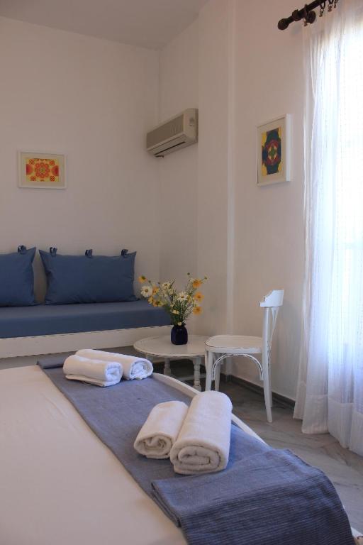 Postel nebo postele na pokoji v ubytování Hotel Swiss Home
