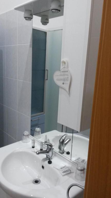 Koupelna v ubytování Hotel Mimosa Pantheon