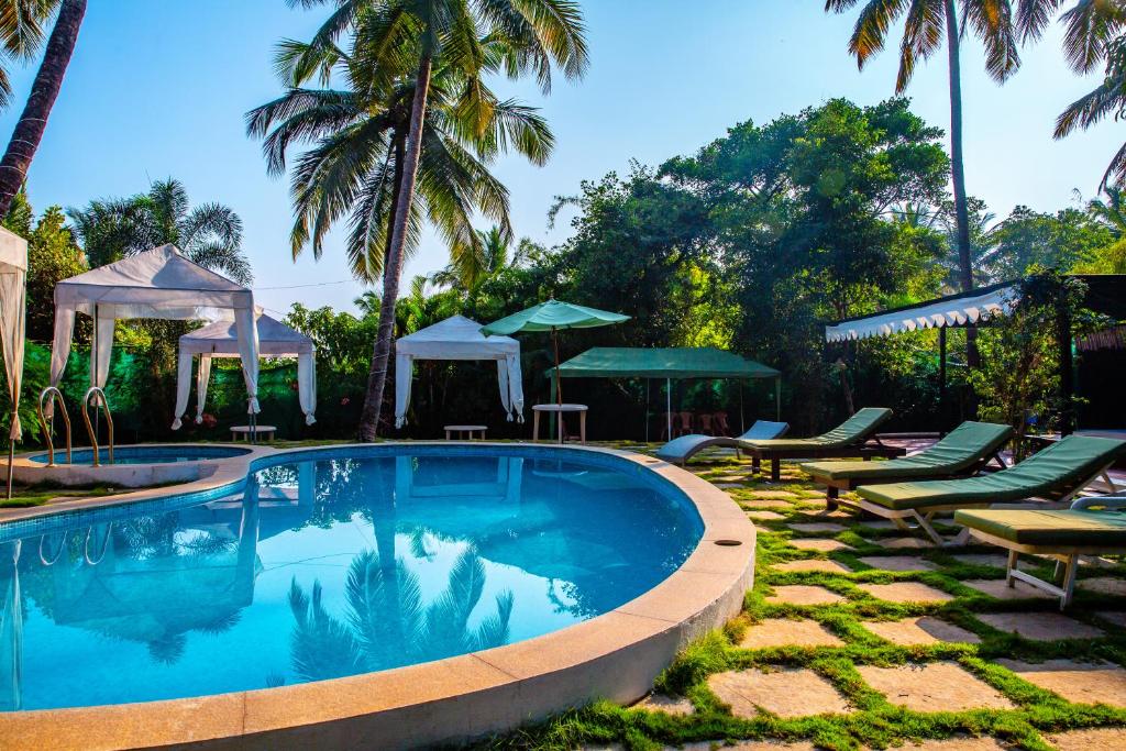 Bazén v ubytování Resort Martins Siesta , A Portuguese Heritage Resort in Calangute nebo v jeho okolí