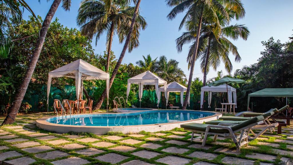 Bazén v ubytování Resort Martins Siesta , A Portuguese Heritage Resort in Calangute nebo v jeho okolí