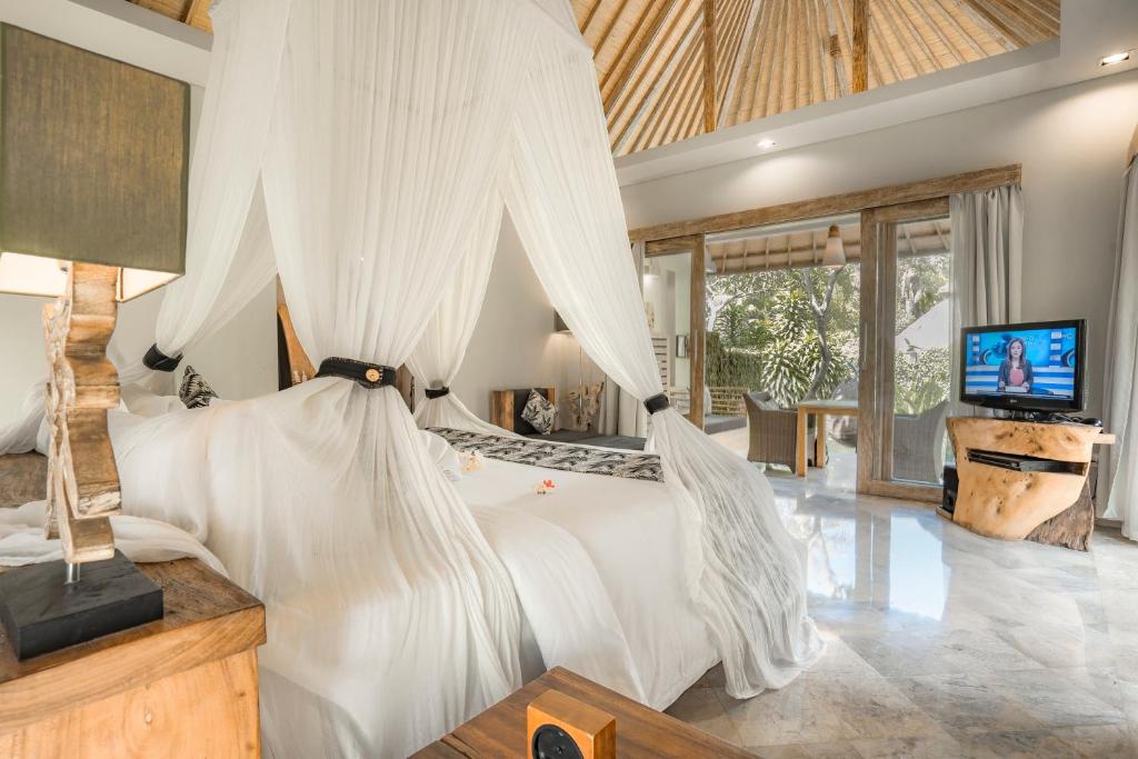 TV a/nebo společenská místnost v ubytování KajaNe Mua at Ubud Bali