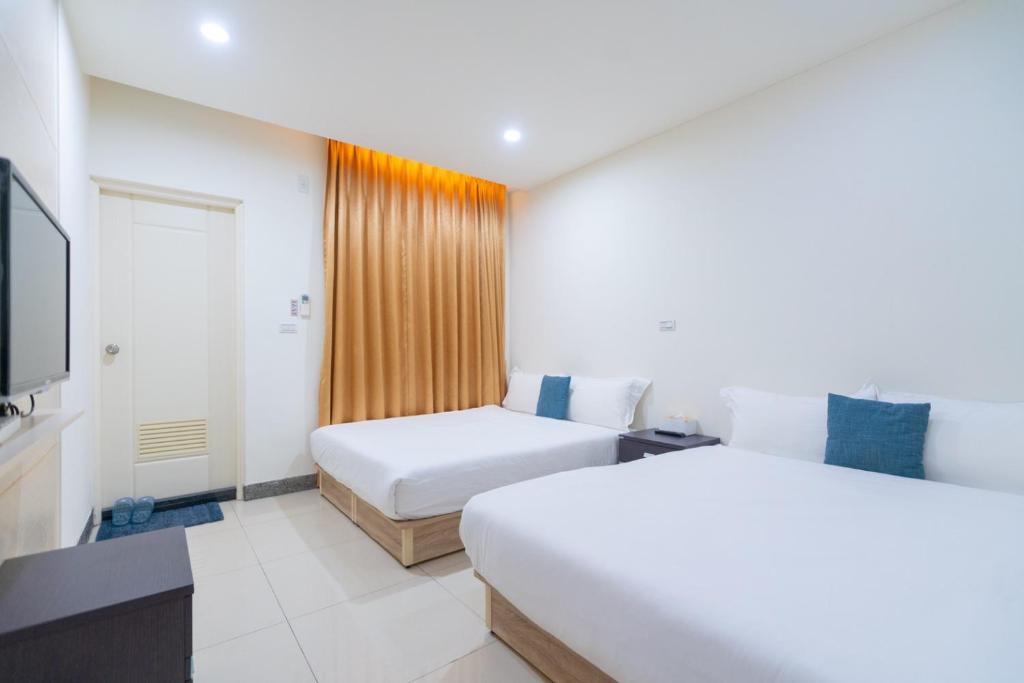 Postel nebo postele na pokoji v ubytování Love vacation B&B