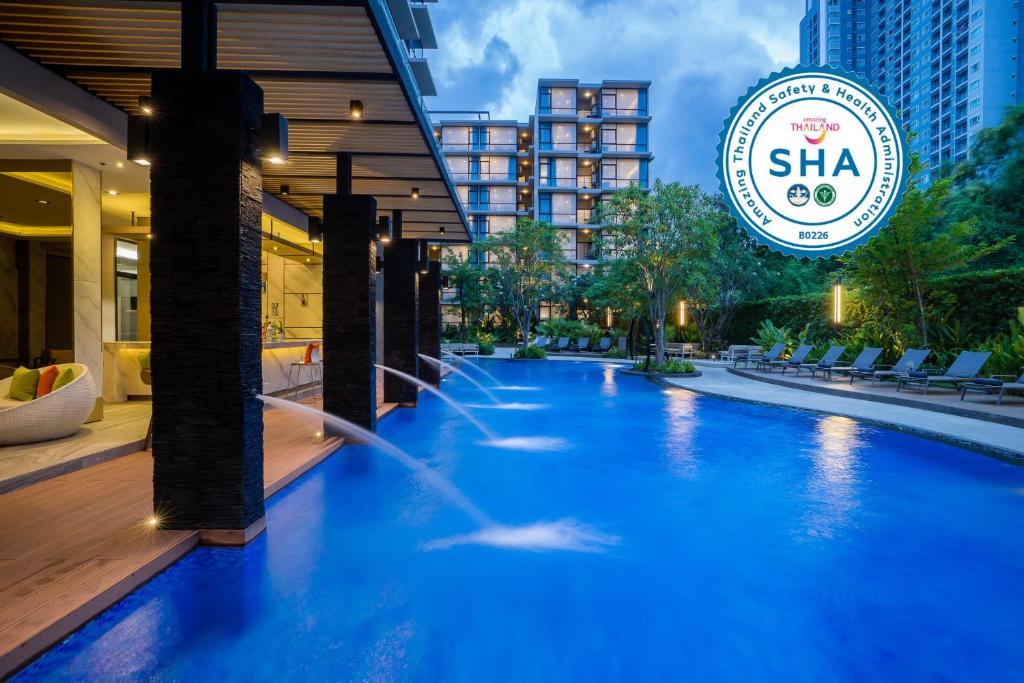 The swimming pool at or close to Altera Hotel and Residence by At Mind