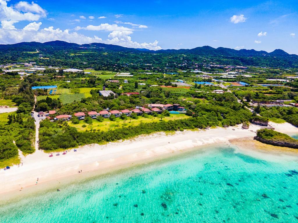 an aerial view of a beach with a resort at Nagahama Beach Resort Kanon in Nakijin