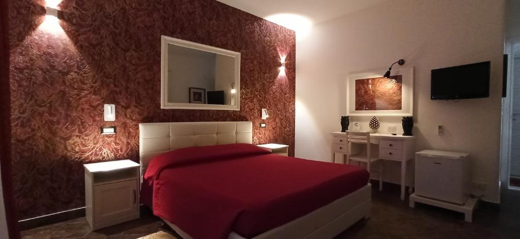 Postel nebo postele na pokoji v ubytování B&B Triskèles