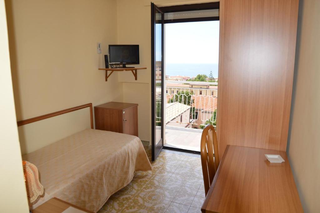 TV a/nebo společenská místnost v ubytování Hotel Virgilio