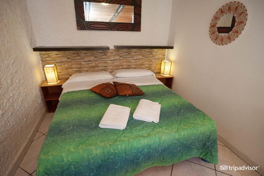 Postel nebo postele na pokoji v ubytování Solemare Accommodation Alghero