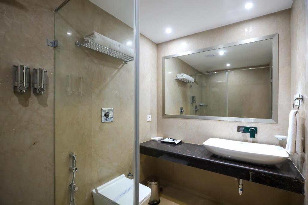Koupelna v ubytování Hotel Aadithya
